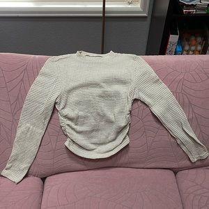 Tight and scrunchy on side of torso, used it as undershirt when wearing t-shirts